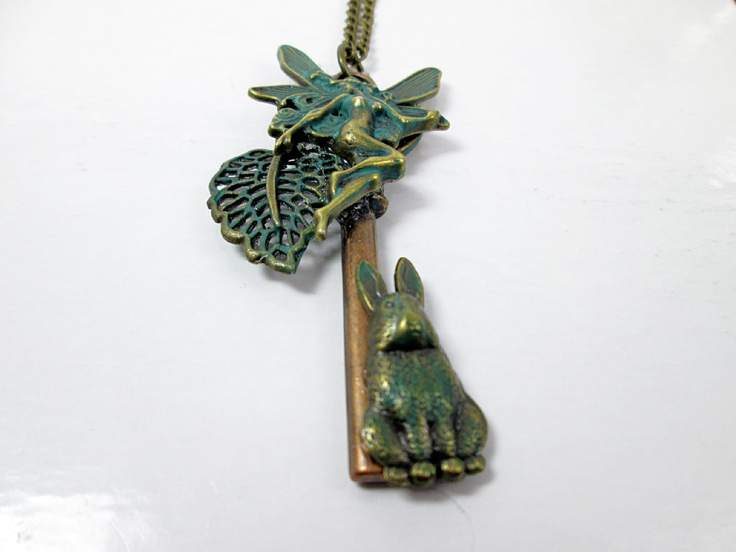 vintage inspired rabbit key necklace with garden fairy