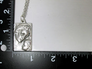 Madonna and Child pendant with measurement