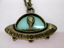 Load image into Gallery viewer, green glowing spaceship necklace