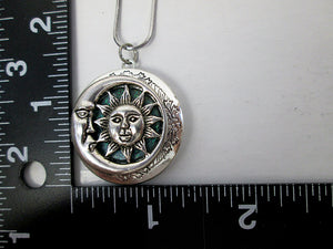 moon and sun locket with measurement