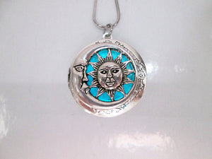 glowing moon and sun locket necklace
