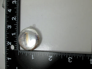 back view of locket with measurement
