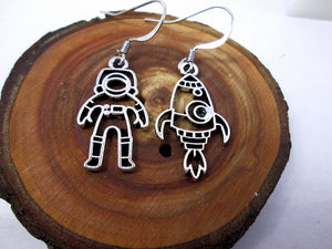 astronaut and rocket spaceship mis-match earrings 