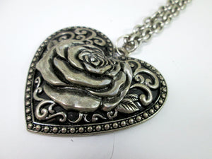 antique style rose heart necklace close up