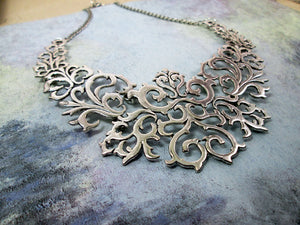 silver metal bib statement necklace