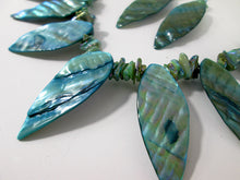 Load image into Gallery viewer, closeup view of teal shells necklace