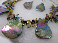 Load image into Gallery viewer, closeup view of rainbow bronze seashell and pearl necklace and earrings set