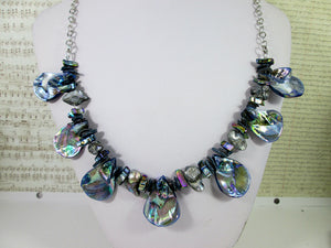 back view of rainbow blue seashell and pearl necklace
