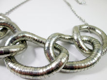 Load image into Gallery viewer, closeup view of  five circles interlocking necklace