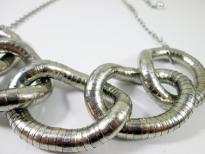 closeup view of  five circles interlocking necklace