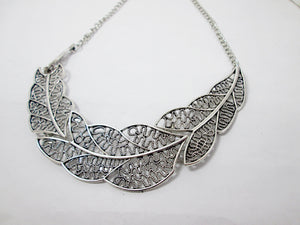 silver filigree leaf sideways necklace
