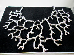 geometric branch bib necklace