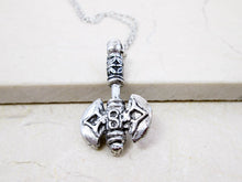 Load image into Gallery viewer, handmade pewter Celtic axe pendant necklace, double blade, double sided. for man or women. pendant on metal chain. (photo taken on a beige marble background)