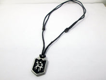 Load image into Gallery viewer, full view of handmade pewter horse rider pendant necklace, pendant with black background, on black cord, for men or women. (photo taken of necklace on a white background)