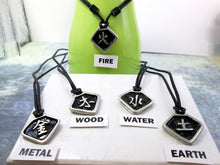 Load image into Gallery viewer, Kanji symbol for element of metal, wood, water, fire, earth pendant necklace, pendant with black background, necklace on black cord.