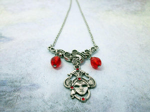 artist mask necklace