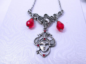 artist mask pendant