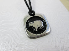 Load image into Gallery viewer, Year of the ox Chinese zodiac pendant necklace for unisex, squarish pendant with black background, cotton cord style. (picture taken on a white background)