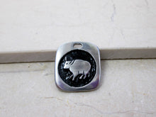 Load image into Gallery viewer, Year of the ox Chinese zodiac pendant for unisex, squarish pendant with black background. (picture taken on a marble background)