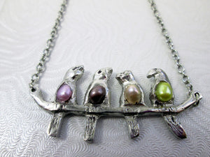 four birds necklace