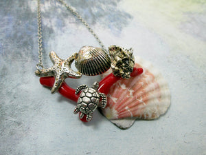 red coral and sea charms necklace