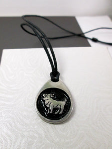 ram necklace pendant, teardrop pendant with black background, on black cord, for man or woman.