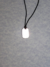 Load image into Gallery viewer, back view of maple leaf pendant on black cord, showing pendant polished to mirror finish.