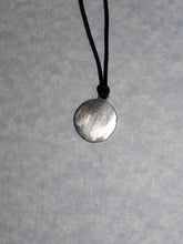 Load image into Gallery viewer, back view of pendant on black cord, pendant polished to mirror finish.