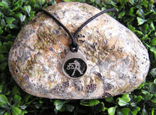 Load image into Gallery viewer, Libra horoscope pendant necklace on black cord, teardrop pendant with black background, for man or woman. (photo taken on background with a rock)