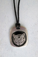 Load image into Gallery viewer, Year of the tiger Chinese zodiac pendant necklace for unisex, squarish pendant with black background, cotton cord style. (picture taken on a white background)