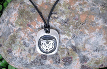 Load image into Gallery viewer, Year of the tiger Chinese zodiac pendant necklace for unisex, squarish pendant with black background, cotton cord style. (picture taken on a background with a rock)