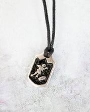 Load image into Gallery viewer, handmade pewter football player pendant necklace, pendant with black background, on black cord, for man or woman.