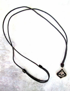handmade pewter yoga lotus pendant necklace, pendant with black background, on black cord, for men or women.