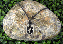 Load image into Gallery viewer, handmade pewter dancer pendant necklace, pendant with black background, on black cord, for teen girl or woman. (photo taken on a background with a rock)