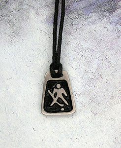 handmade pewter hockey goalie pendant necklace, polygon pendant with black background, for men or women, on black cord. 
