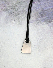 Load image into Gallery viewer, back view of hockey goalie pendant on black cord, pendant polished to mirror finish.