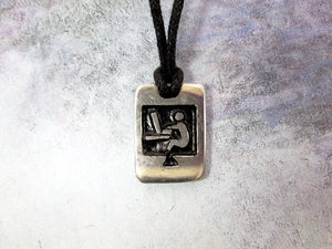 video game player pendant necklace, pendant with black background, on black cord, for men or women.